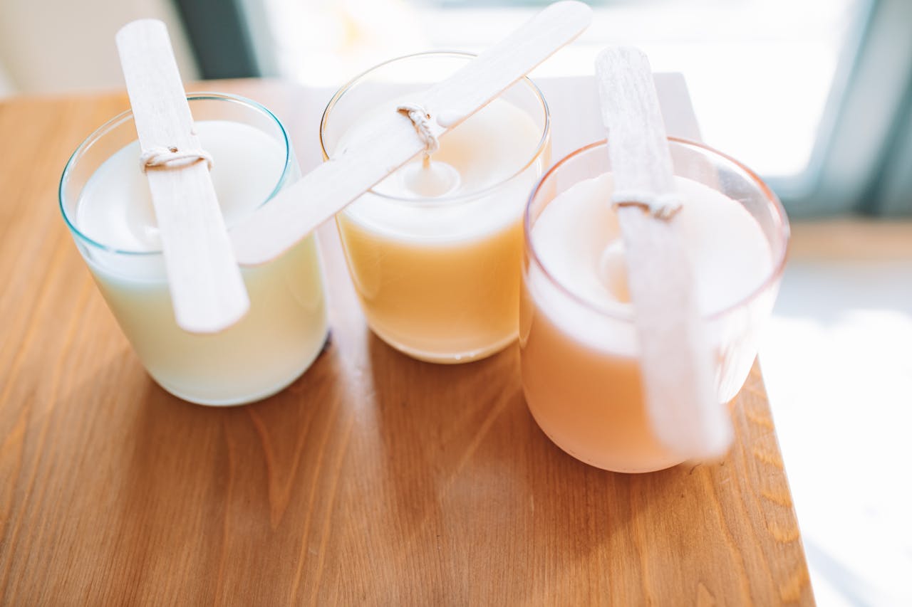 Crafting Captivating Headlines: Your awesome post title goes here High-angle view of homemade scented candles with wooden wicks. Perfect for DIY crafts and home decor inspiration.